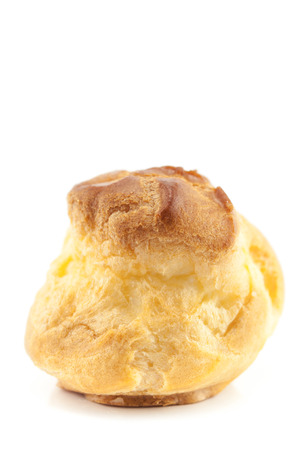 Eclair cake filled vanilla custard isolated on white backgroundの写真素材