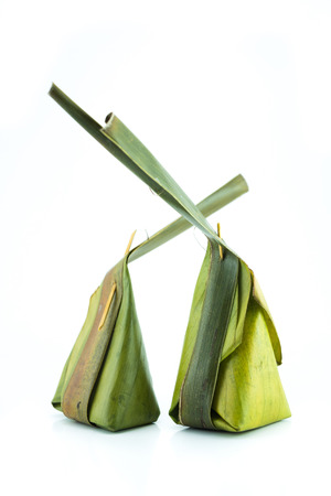 Fish curry in banana leaves, local Thai food, Isolated on white backgroundの写真素材