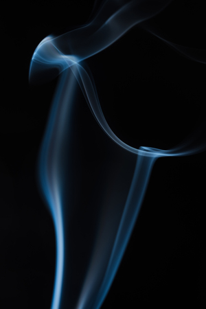 movement of smoke on black background, smoke background, abstract smoke on black backgroundの写真素材