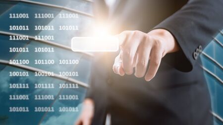 Business man pointing at white buttonの写真素材