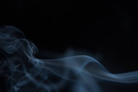 movement of smoke on black background, smoke background, abstract smoke on black backgroundの写真素材