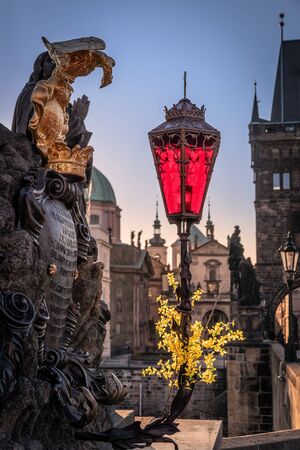 Statue of the Virgin with St. Bernard. With a newly restored red lamp. Pragueの写真素材