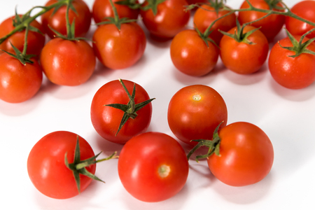 cherry tomatoes, isolated on a white background, macroの写真素材