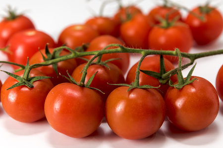 cherry tomatoes, isolated on a white background, macroの写真素材