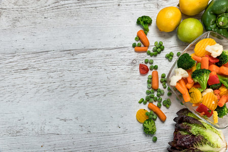 Raw vegetables cut into myskish several types of vegetables to prepare food laid on the table