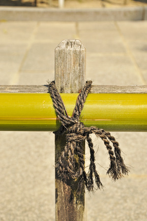 Rope knot on the fence の写真素材