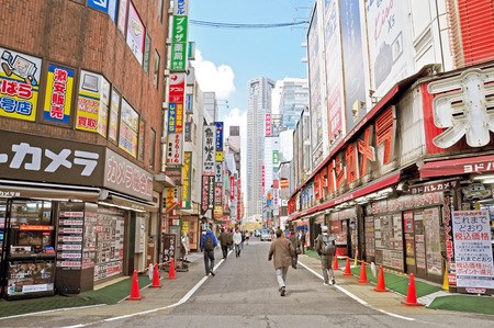 TOKYO - APRIL 06  Shinjuku on April 06, 2014 in Tokyo, Japan  Shinjuku is one of the busiest districts of Tokyo, with many international corporate headquarters located here のeditorial素材