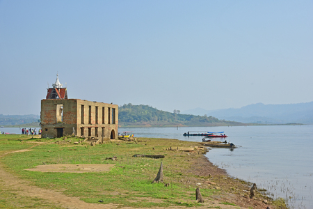 SANGKHLABURI-KANCHANABURI, THAILAND - MARCH 30 Sunken Temple is the last remaining vestige of the old town flooded for the creation of Khao Laem Reservoir on March 30, 2015 in Sangkhlaburi, Kanchanaburi, Thailand.のeditorial素材