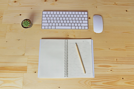 Business accessories on wooden desk background of workplace, flat lay.のeditorial素材