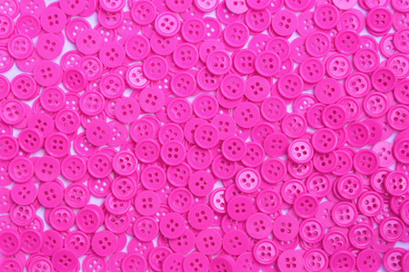 Pink buttons (clasper) for decoration and background.