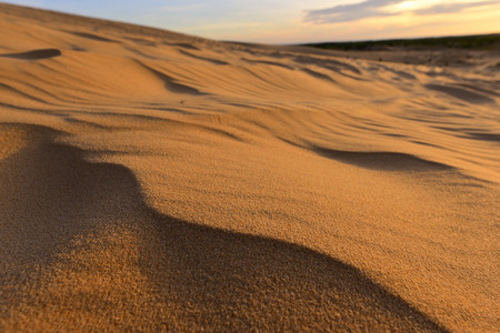 Close up of white sand dunes at Mui Ne, Vietnam.の写真素材