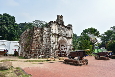 MALACCA, MALAYSIA - AUGUST 01, 2015: Tourists are walking nearly remains Portuguese A Famosa Fort in Malacca, Malaysia.のeditorial素材