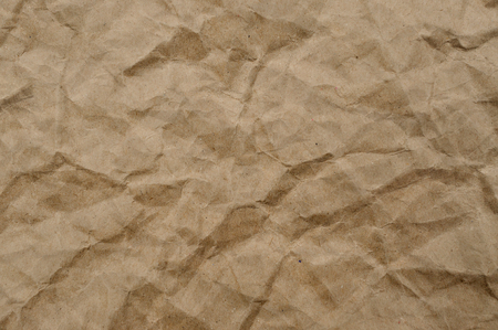 Texture of brown crumpled paper for background.の写真素材