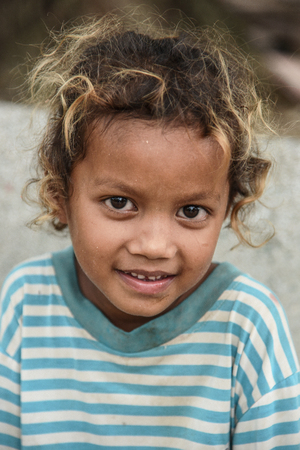 POIPET-BANTEAY MEANCHEY, CAMBODIA - SEP 14 Portrait of unidentified girl smiling on September 14, 2017 in Poipet-Banteay Meanchey, Cambodia.のeditorial素材