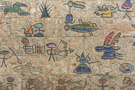 LIJIANG, YUNNAN, CHINA - OCTOBER 09, 2017: Naxi Dongba paintings on the wall in old town of Lijiang, Yunnan, China.のeditorial素材