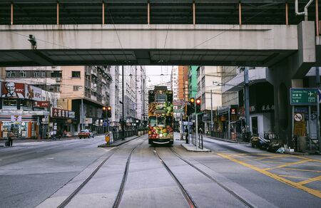 HONG KONG - MARCH 31 : Trams on the road on March 31, 2018 in Hong Kong. Hong Kong tram is the only system in the world run with double deckers and one of the main tourist attractions.のeditorial素材