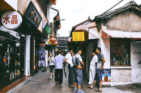 SHANGHAI, CHINA - JUNE 26 : Tourists visiting Qibao old town on June 26, 2013 in Shanghai, China.のeditorial素材