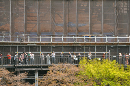 KYOTO,  JAPAN - APRIL 10, 2014 : Tourists taking photos at Kiyomizu-dera Temple in Kyoto, Japan.のeditorial素材