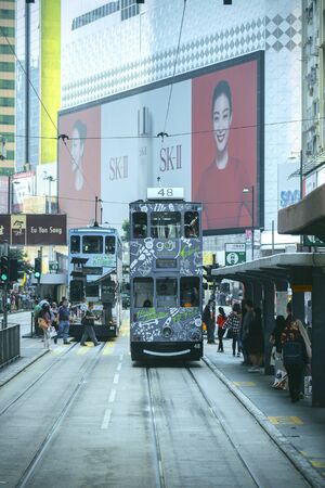 HONG KONG - APRIL 01 : Trams on the road on April 01, 2018 in Hong Kong. Hong Kong tram is the only system in the world run with double deckers and one of the main tourist attractions.のeditorial素材