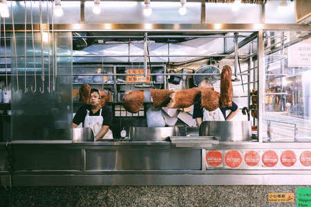 SHEUNG WAN, HONG KONG - MARCH 31, 2018 : Roasted duck shop in Sheung Wan district, Hong Kong.のeditorial素材