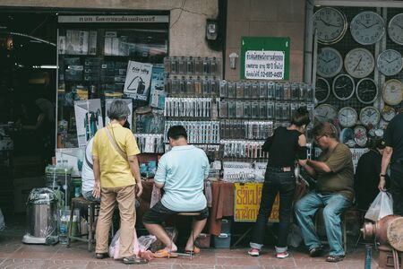 BANGKOK, THAILAND - JULY 13, 2018 : Clocks and watches shop on Yaowarat road of China Town in Bangkok, Thailand.のeditorial素材