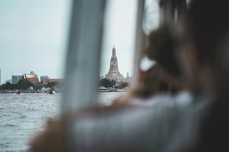 View of Wat Arun (Temple of Dawn) from the Chao Phraya Express Boat in Bangkok, Thailand.のeditorial素材