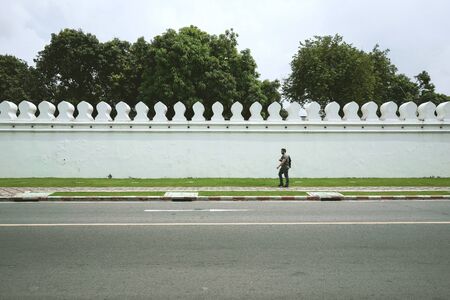 BANGKOK; THAILAND - OCTOBER 15; 2018 : Tourist walking on the footpath at Wat Phra Kaew in Bangkok, Thailand.のeditorial素材