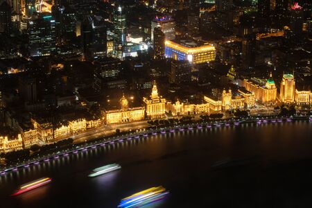 SHANGHAI, CHINA - MAY 20, 2019: Old buildings of Shanghai at the Bund and Huangpu river in Shanghai, China.のeditorial素材