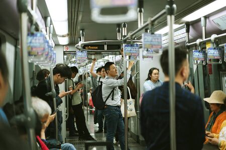 SHANGHAI, CHINA - MAY 17, 2019 : Unidentified passengers travelingin by Shanghai Metro, China.のeditorial素材
