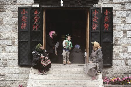 DAOCHENG-SICHUAN, CHINA - OCTOBER 14, 2017 : Unidentified people walking in local grocery store at Yading national reserve in Daocheng county, Sichuan province, China.のeditorial素材