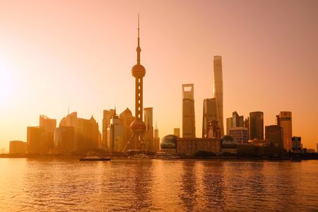 SHANGHAI, CHINA - MAY 22, 2019: Shanghai skyline and Huangpu river with sunrise glow in Shanghai, China.のeditorial素材