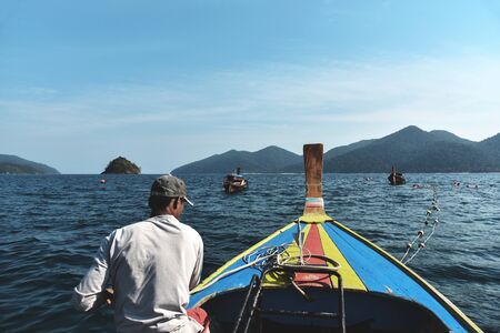 Tourists in Lipe island at Tarutao national park in Satun Province, Thailand.の写真素材