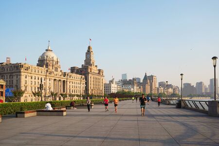 SHANGHAI, CHINA - MAY 23, 2019: Unidentified people running at The Bund (Waitan) in the morning in Shanghai, China.のeditorial素材