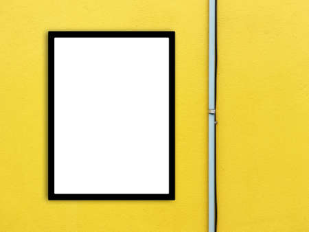 Photo frame mockup with pipe on yellow wall.  Minimal style.の写真素材