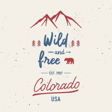 Wild and free with Colorado hand lettering. Travel concept with mountains and abstract watercolor splatters.のイラスト素材