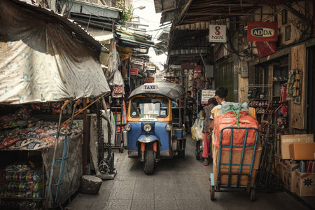 BANGKOK, THAILAND - 4 NOVEMBER, 2020 : Unidentified people working in Sampeng Market. It is one of...