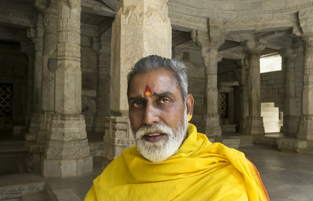 Ranakpur, Rajasthan, India - June 18 2015: Portrait of high priest of Jain Temple, Ranakpur. Jainism is an Indian religion that emphasizes complete non-violence and asceticism. Jainism emerged in 6th-century BCE India, the same time Buddhism was developinのeditorial素材