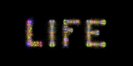 Life text written with Colorful Sparkling Fireworks over black sky  backgroundの写真素材
