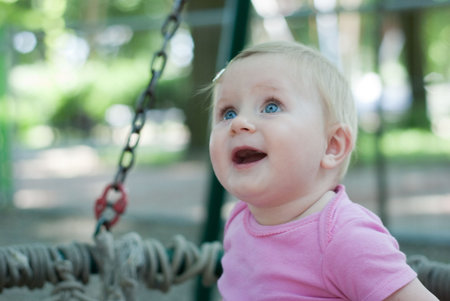kid looking joyfull upwards