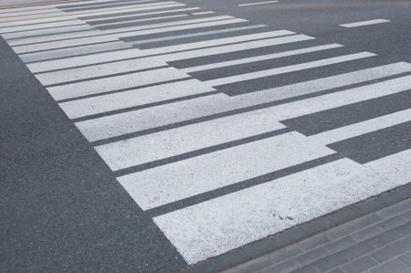 White keyboard piano painted pedestrian crossing on the road in Warsaw