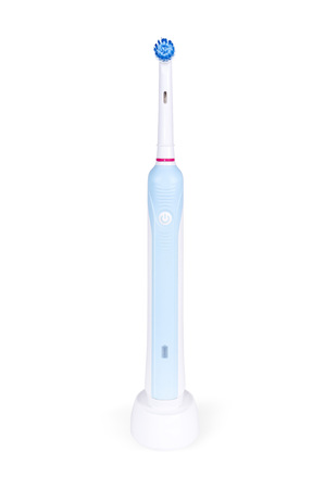 Electric toothbrush isolated on a white - path includedの写真素材