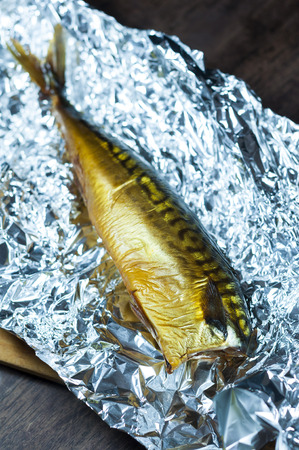 Smoked mackerel on kitchen background - studio shotの写真素材