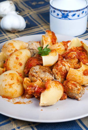 lumaconi pasta with meatballs in tomato sauce rusticaの写真素材