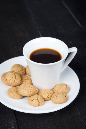Coffee espresso on background stylish background with amaretti biscuitsの写真素材