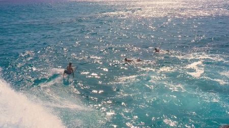 Surfer on the wave from aboveの素材