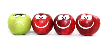 Apples-smilies symbolise themselves difference of one from the othersの写真素材