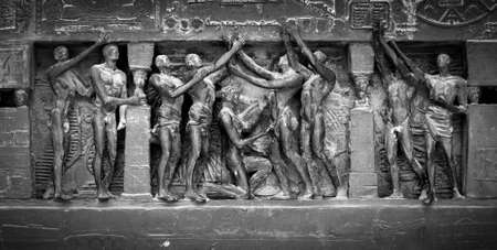 Black and white image showing detail from the Human Rights Monument in Paris, France, near the Eiffel Tower and the Champs de Mars. Image has an added film grain effect.の写真素材