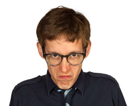 Man in black shirt and tie with glasses looking displeased, isolated on white background の写真素材
