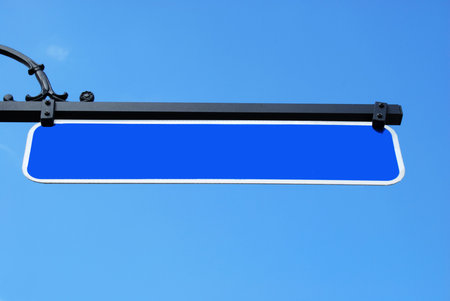blank sign against a blue skyの写真素材