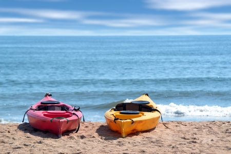 two kayaks on the beachの写真素材
